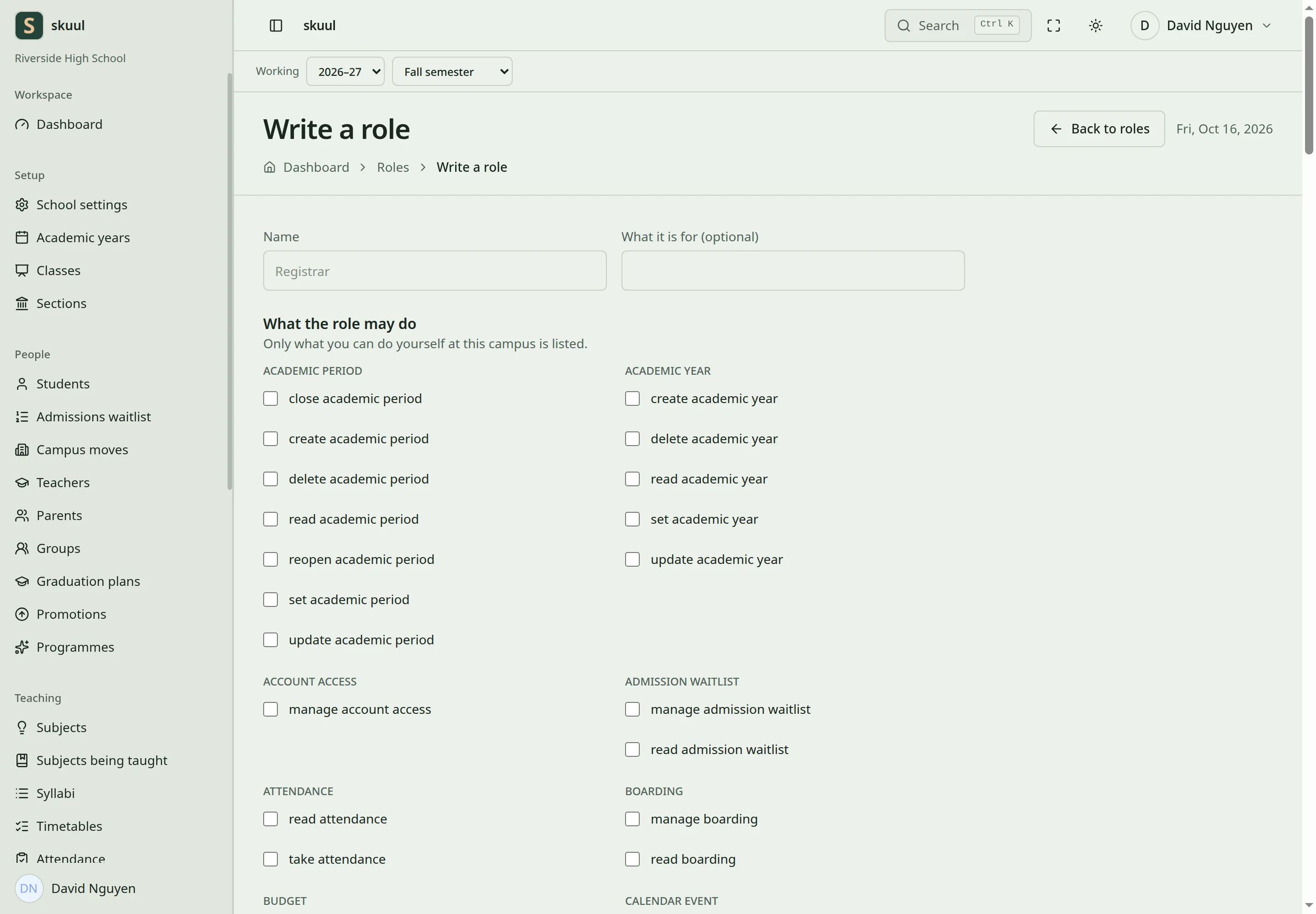 The role form has a name field and permission check boxes grouped by area.